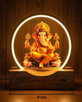 Lord Ganesh glow LED lamp on a wooden base